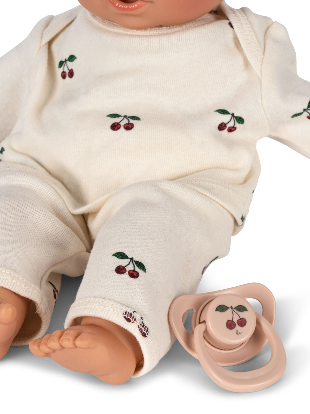 Lalka z miękkim brzuszkiem, ubrankiem i smoczkiem Konges Slojd BEBE Concept 