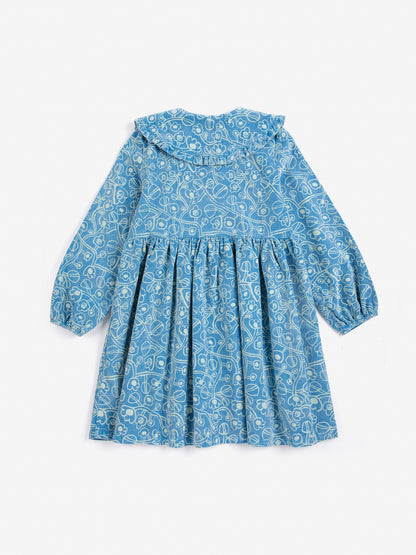Robe en velours côtelé à fleurs esquissées
