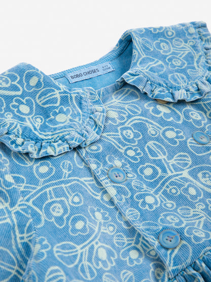 Robe en velours côtelé à fleurs esquissées