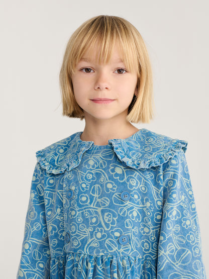 Robe en velours côtelé à fleurs esquissées